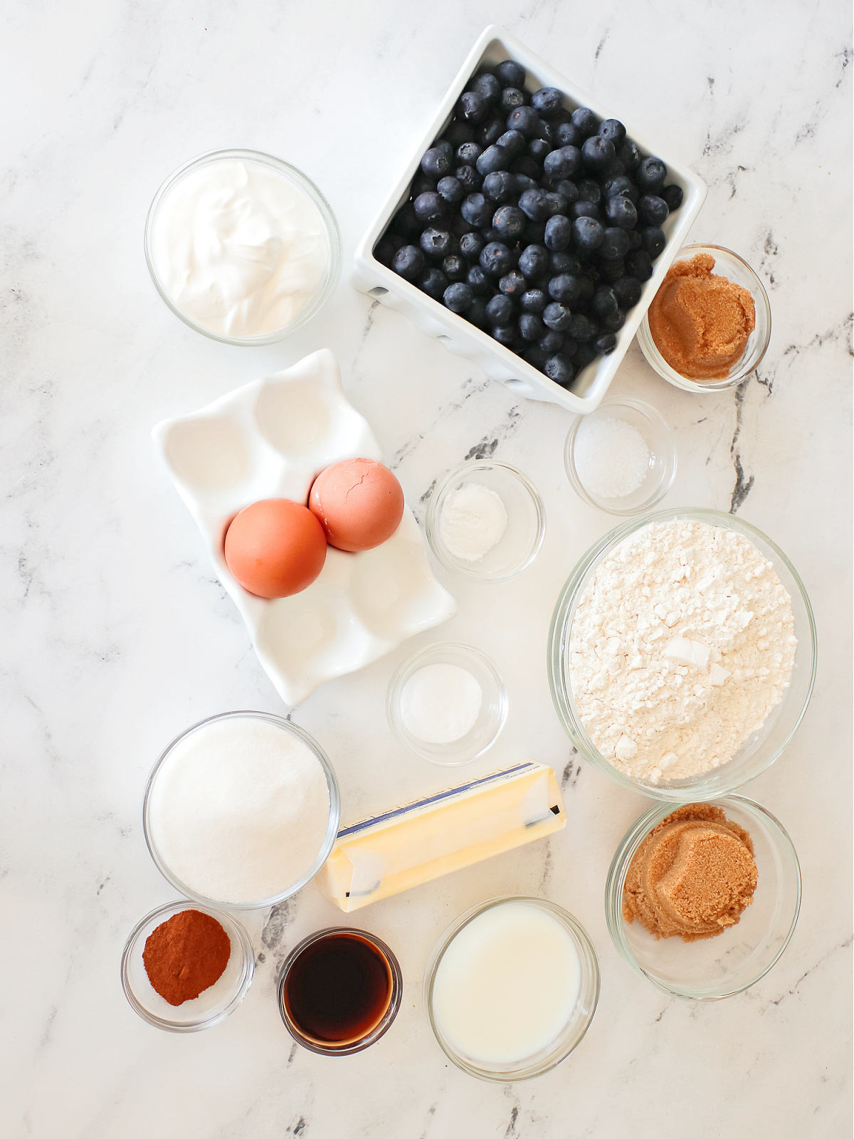 Ingredients to make blueberry muffins.