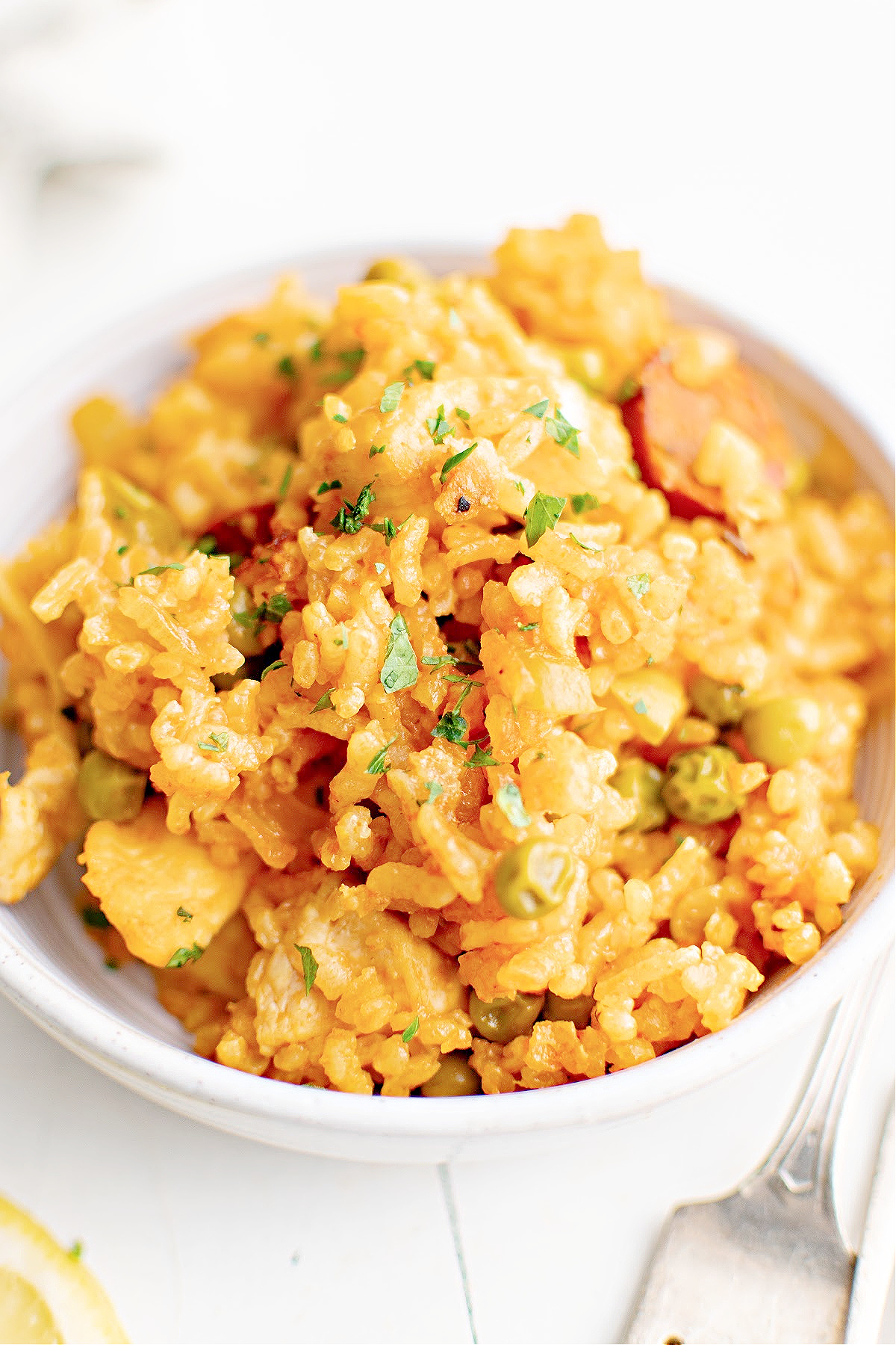 Bowl of chicken and chorizo paella.