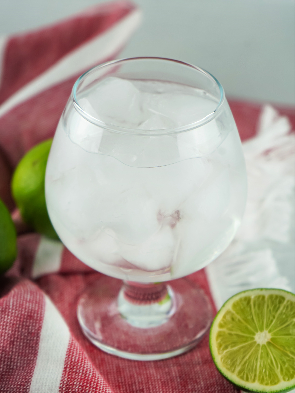 Large glass with lemon-lime soda and ice.