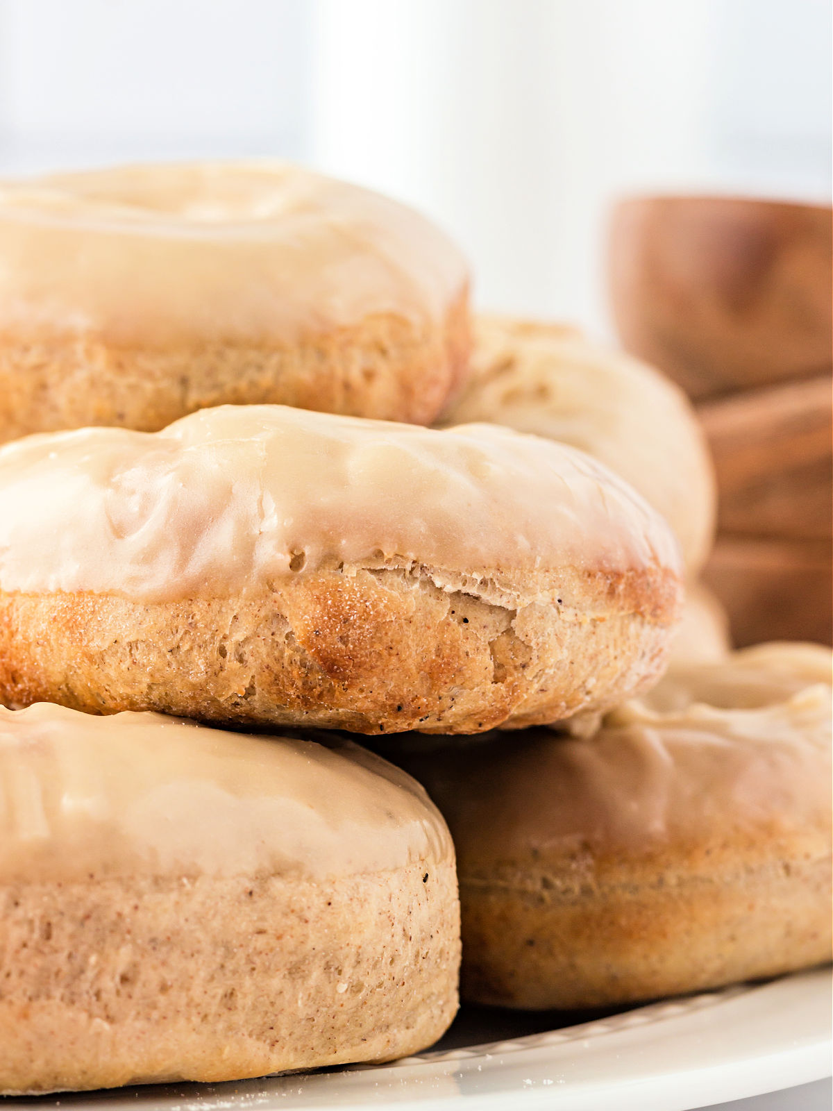 Stack of maple donuts.