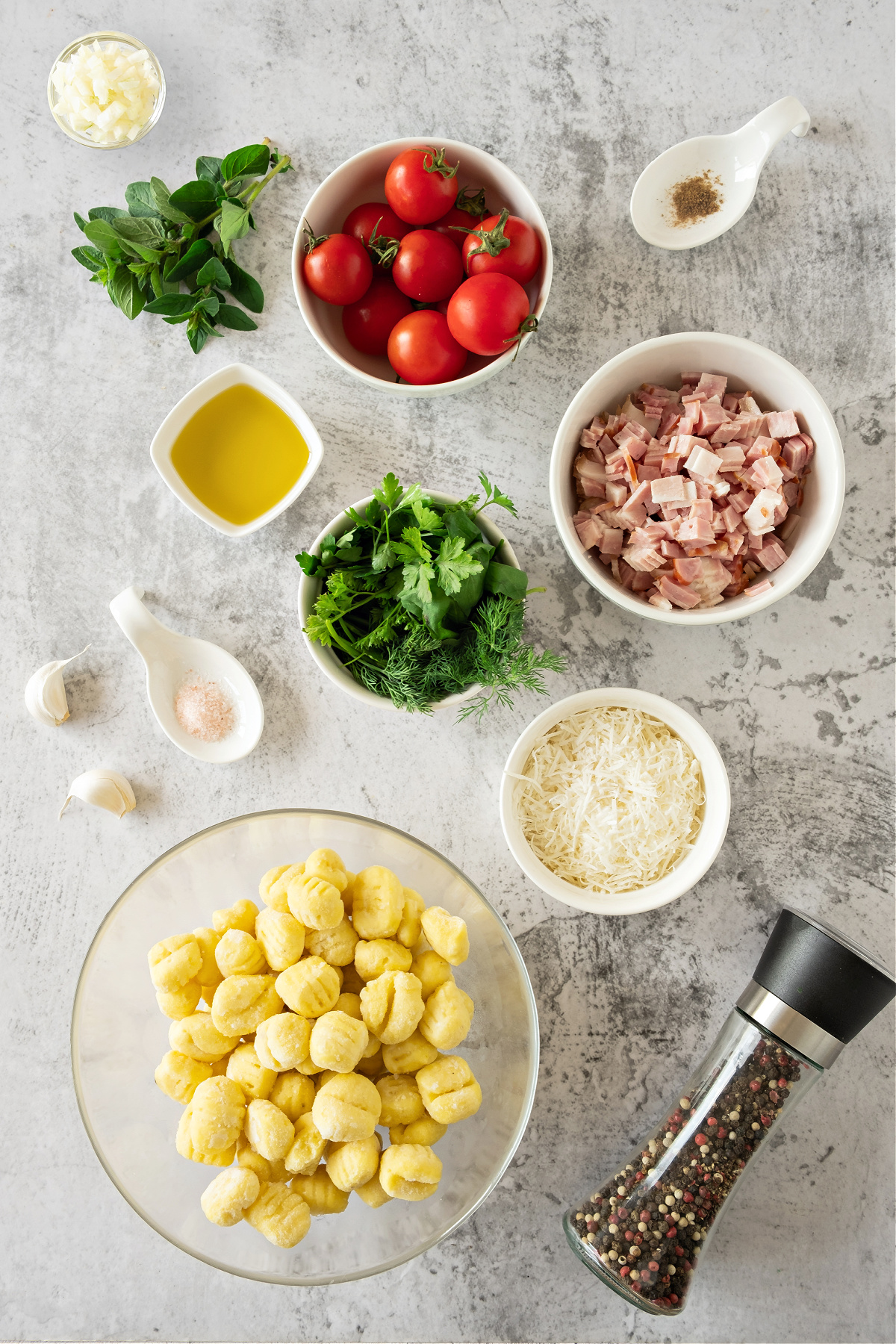 Ingredients to make potato gnocchi with bacon.