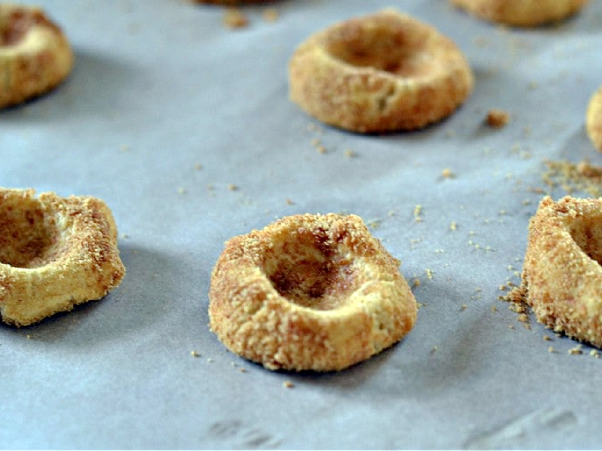 Cookies with thumbprint impressions in the middle.