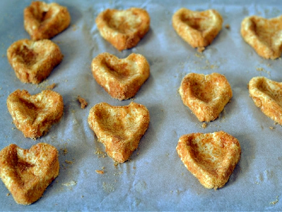 Thumbprint cookies shaped like hearts.