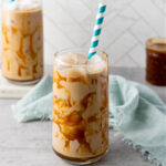 Two glasses of iced caramel coffee.